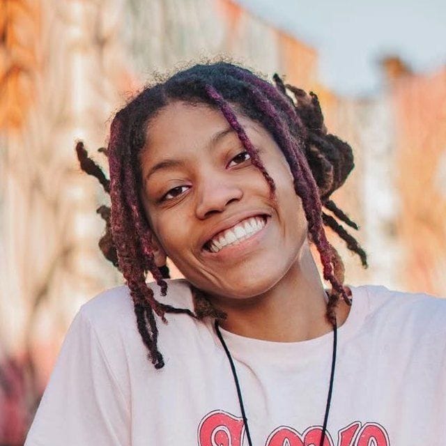 Mona Moore, owner and stylist at MomoLocs